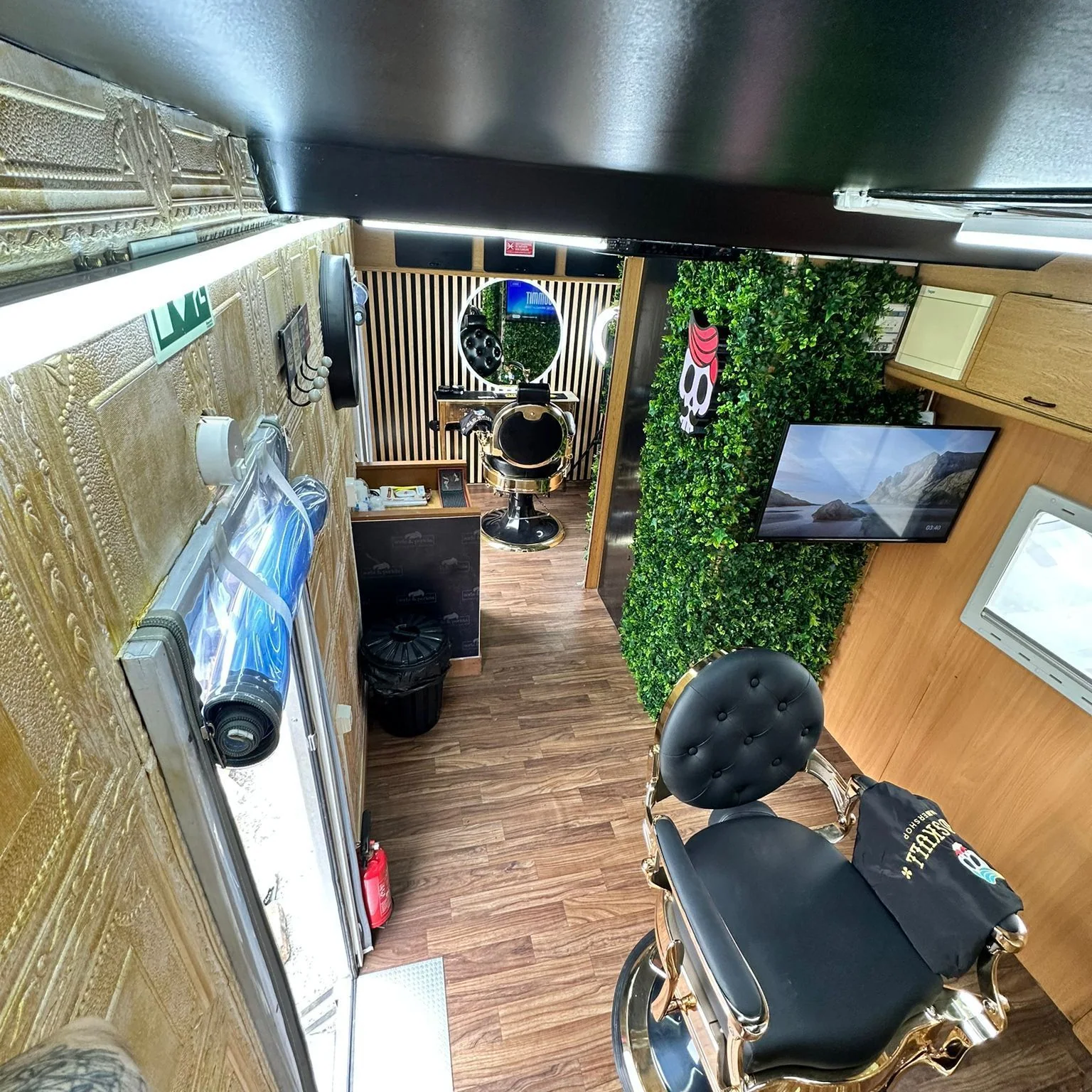 Inside the Old Skull van in Porto Santo, with barber chair and mirror