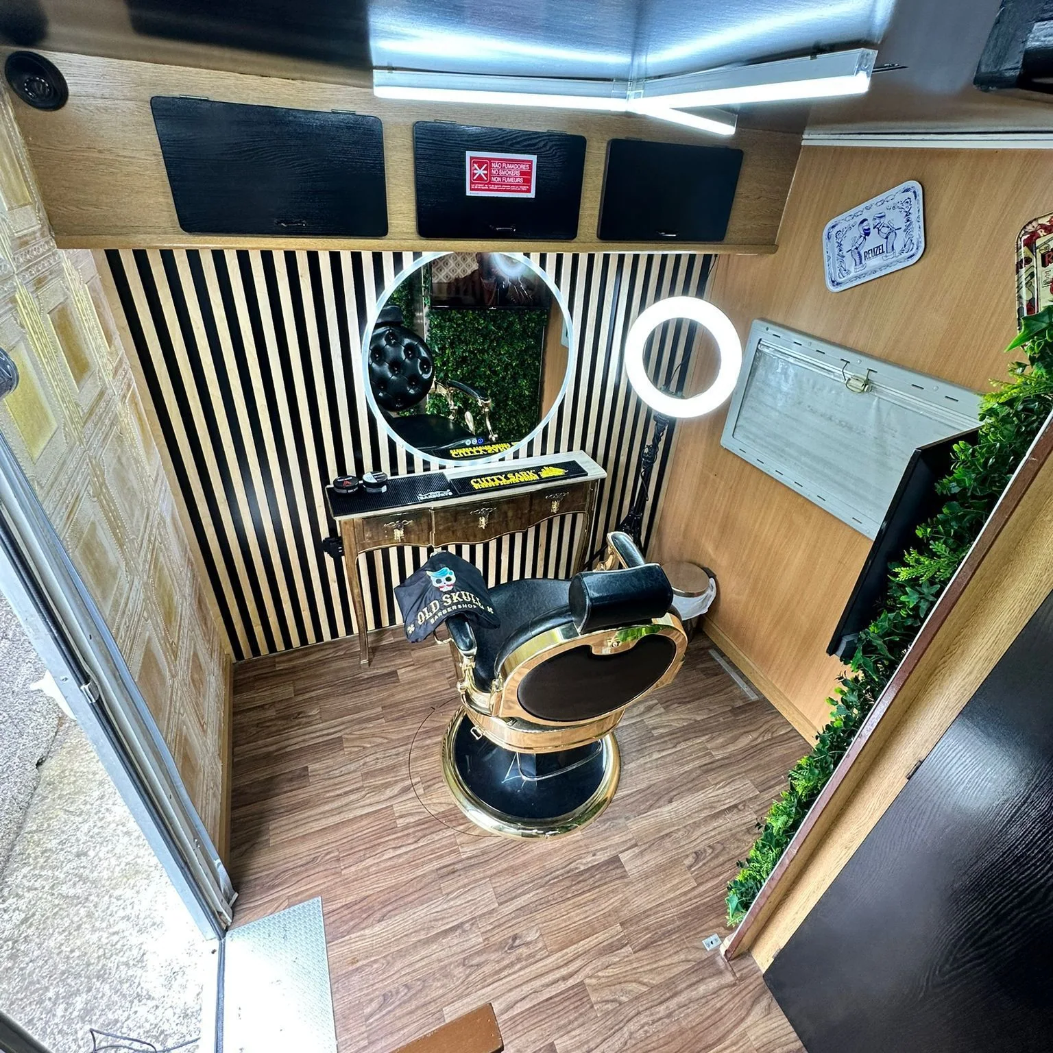 Barber chair and workstation inside the Old Skull van
