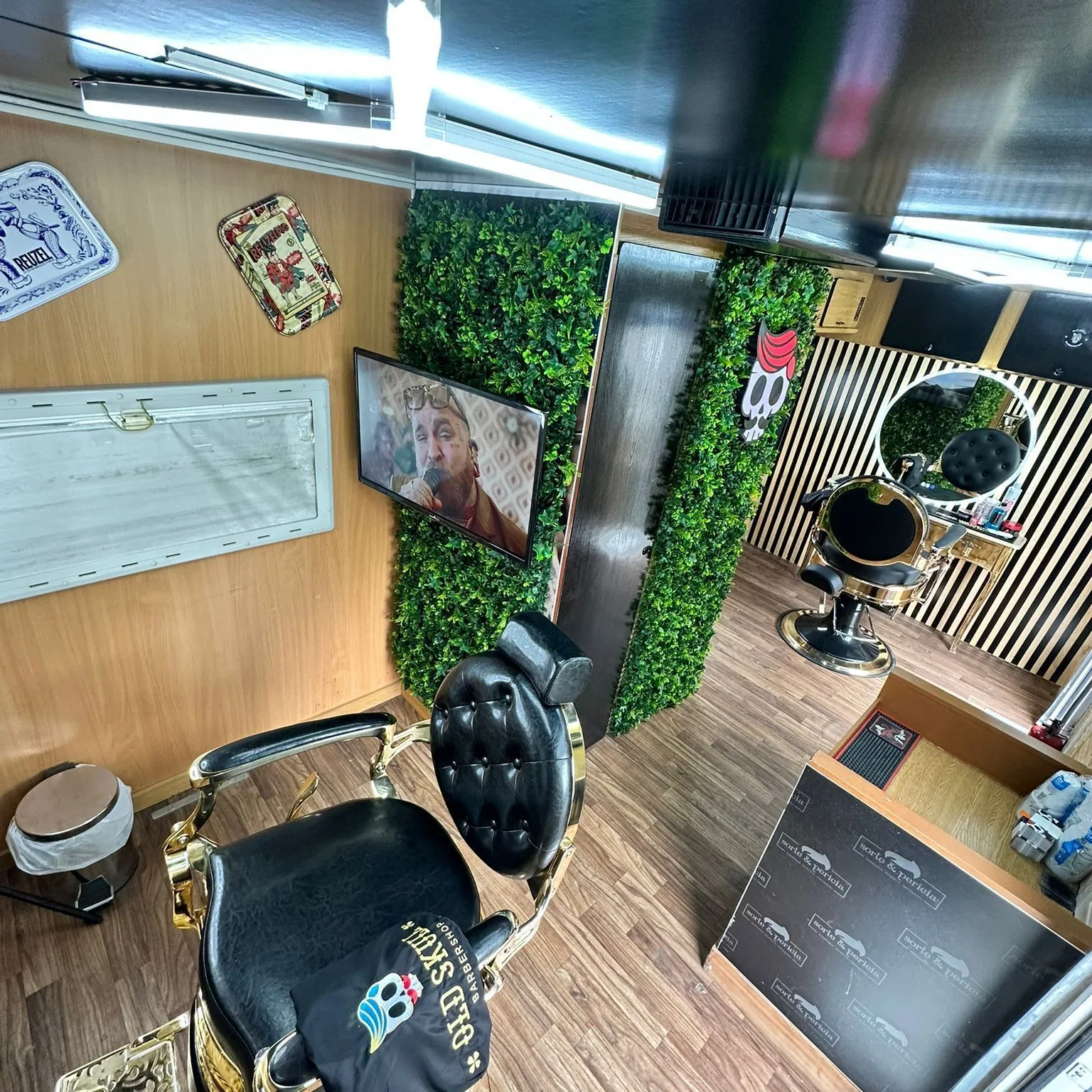 Interior detail of the Old Skull van with gold chair and mirror